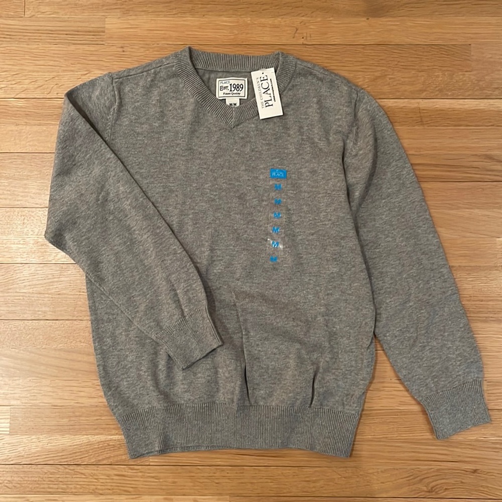 NWT - children’s medium (size 7-8), lightweight cotton sweater.